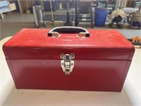 Red metal tool box with tray