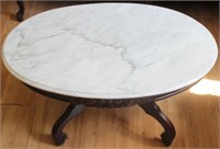 Oval marble top rose carved coffee table