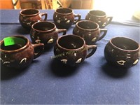8 Stoneware Face Mugs