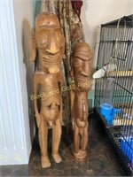Pair of hand carved wooden statues