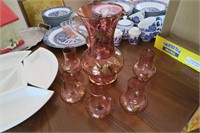 pink pitcher with gold trim & 6 matching goblets