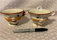 PAIR WINKING CUPS