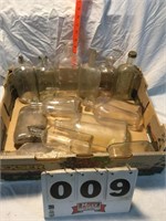 Assorted clear mostly cork  top bottles