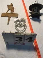 Cast iron birdfeeder, sign and pot metal face