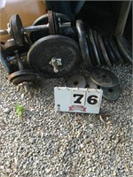 Approximately 150 pounds steel weights with four