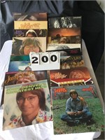 16 John Denver albums and one Alabama album