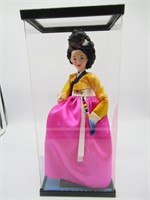 Oriental Doll in case in traditional dress