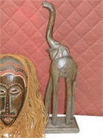 Vintage African mask and an elephant figure
