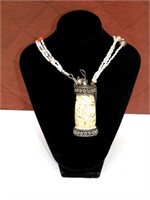 Vintage hand crafted carved bone necklace