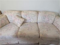 Vintage sofa with curved front
