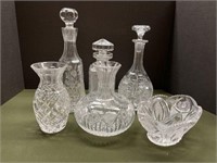 THREE CRYSTAL DECANTERS, TWO CRYSTAL VASES AND