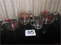 4 PYREX GLASS MEASURING CUPS