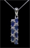 Sterling silver oval cut blue sapphires pendant