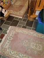 2 matching area rugs