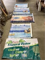 Five large vinyl swim theme banners