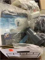 Box of miscellaneous pool supplies