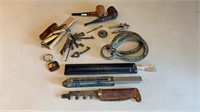 Pipes, antique letter opener, lucite ruler,