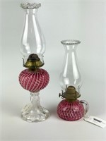 2 Cranberry Glass Oil Lamps