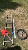 Ladder, yard caution flags, hose, level