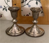 Pair of Sterling candlesticks