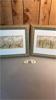 Pair of framed flowers pictures