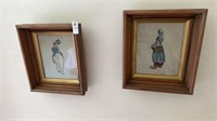 Pair of stitched wall decorations
