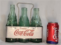 6 Vintage Coca Cola bottles & Metal Carrier