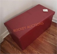 Red pleather blanket box with blankets