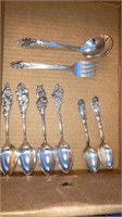 4-Silver plate Reed & Barton floral spoons,