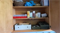 Shelf lot of light bulbs and electrical items