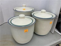 3 piece pottery canister set.