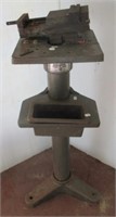 Stand and 4 1/4" vise. Stand measures 34" tall.