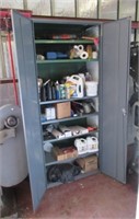 Steel storage cabinet with contents including