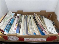 Box of old road maps.
