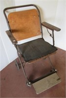Genvron Wheel company antique wheel chair.