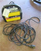 Vector battery charger with extension cord.