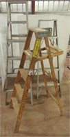 (2) Aluminum step ladders and wood step ladder.