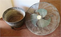 Galvanized bucket and shop fan top.