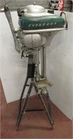 Evinrude zephyr outboard motor on stand. Note