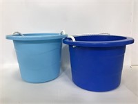 Two shades of blue plastic buckets