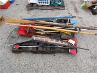 pallet with rakes, shovels, saw & more