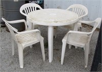 plastic table and 4 chairs