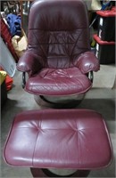 A Mid Century Leather Reclining Chair and Ottoman