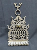 A Wrought Brass Wall Mounted Menorah