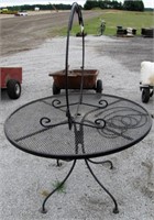 outdoor metal table and firewood rack