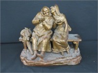 CERAMIC FIGURE OF LADY WHISPERING TO A MAN