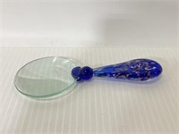 Ornate blue speckled magnifying glass