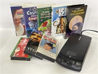 Eight VHS tapes & VHS tape rewinder