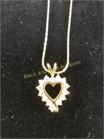 14k necklace with unmarked pendant