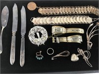 Assorted jewelry includes coin bracelets